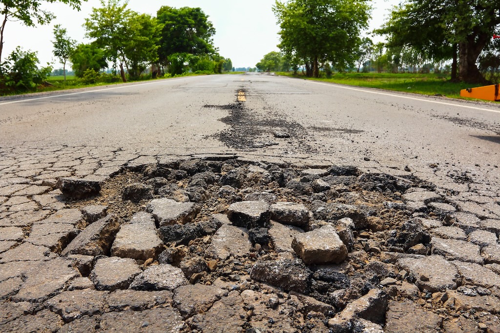 Infrastructure inequality: Who pays the cost of road roughness?